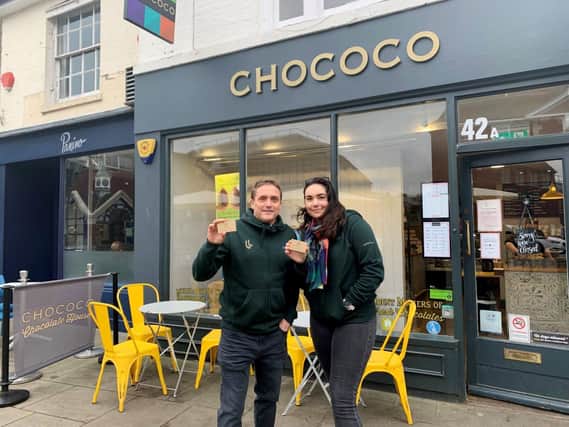 Mark Clover and Amy Walter handing out free Chococo’s hot chocolate vouchers in Horsham Town Centre