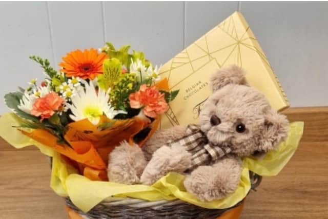 The Flower Shop's gift baskets are very popular, as they are three gifts in one