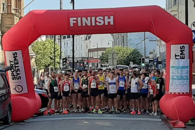Images from the Hastings 5-mile Keith Chandler Memorial Road Race
