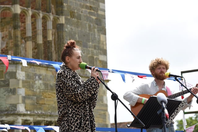 Ellie Baker on stage at the Queen's Platinum Jubilee celebrations at the Cowdray Ruins. Picture: Liz Pearce 04/06/2022