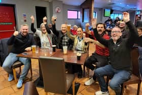 England fans celebrate at the Redz Bar