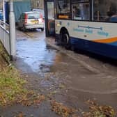 Water gushing out of the bus at the bus stop. Picture: urban rot/YouTube