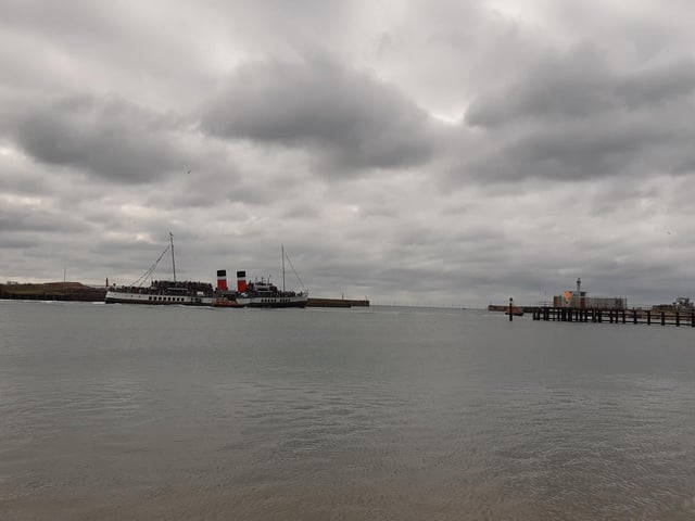 Amazing, stunning, emotional - the large crowd that stood on Kingston Beach to watch the world’s last seagoing paddle steamer make its inaugural visit to Shoreham was visibly moved by the sight of the Waverley making its way in and out of the harbour on Wednesday, September 13.