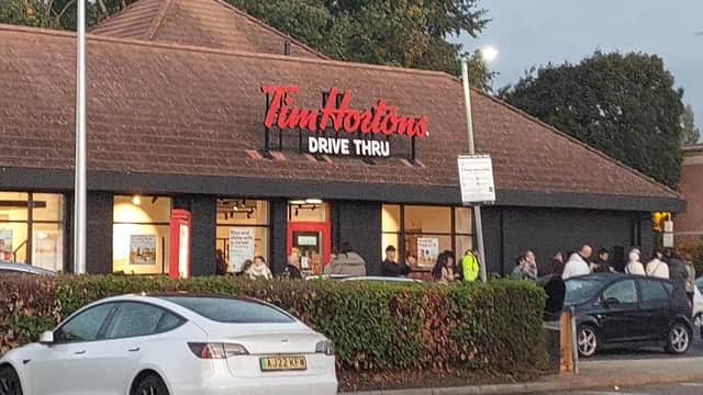 Queues of both cars and people went round the corner of the new Tim Hortons for its opening.