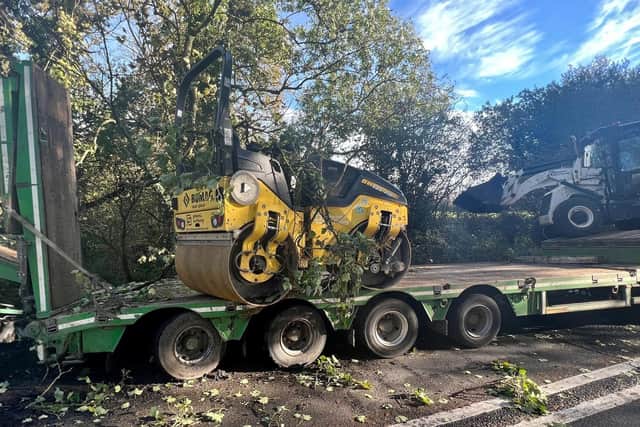 A construction vehicle has fallen off the back of a lorry near Steyning, forcing the A283 to close. Photo: Eddie Mitchell