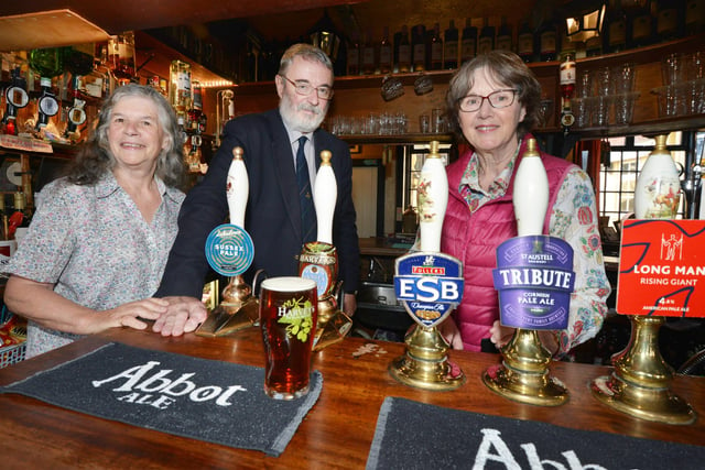 New landlord Alan Pink takes over at the Horse & Groom in St Leonards. L-R: Louise and Alan Pink, and Bee Lang, sister of David Sansbury.