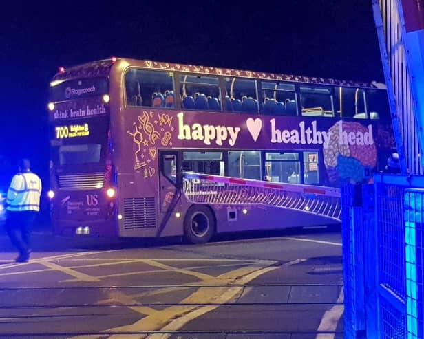 A bus has collided with level crossing barriers in a West Sussex village – causing major railway delays. Photo: Eddie Mitchell