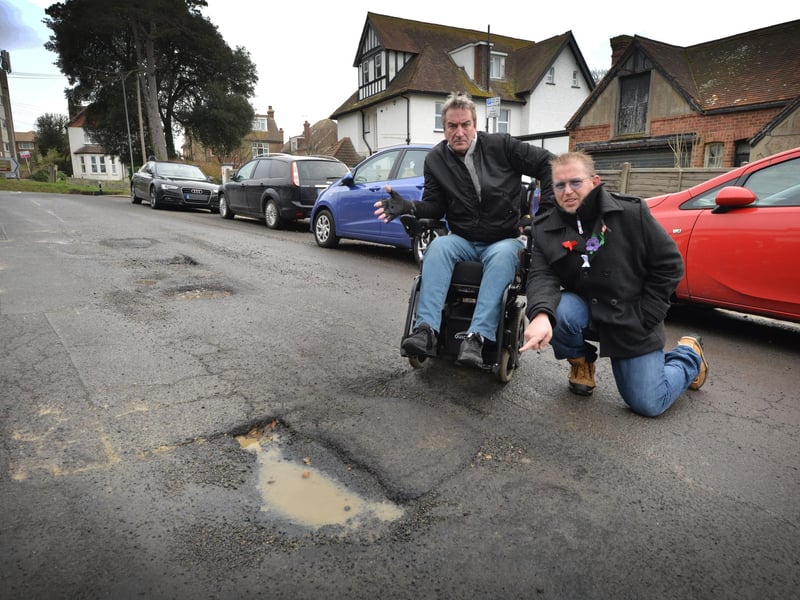 Buckhurst Road potholes and uneven road surface in Bexhill. Councillors John Lee, left, and Andrew Crotty.