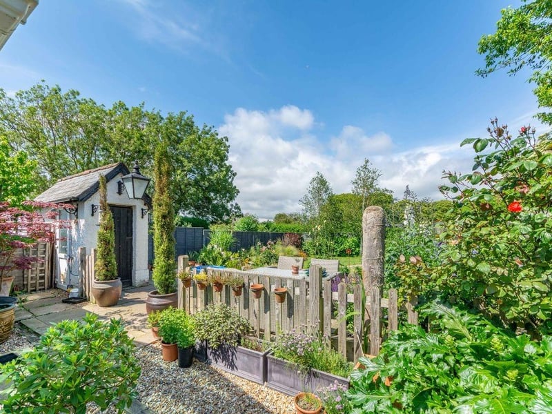 This three-bedroom character property is beautifully presented and Barnham-based Pegasus Properties say the attractive landscaped garden is of particular note.