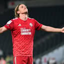 Danilo Orsi celebrates one of his hat-trick in the pla-off semi-final against MK Dons | Picture: Dennis Goodwin/ProSportsImages