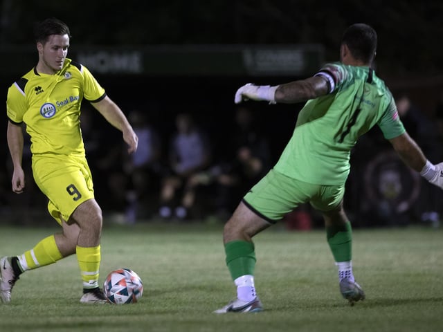 Selsey's Evan Harris rounds Pagham keeper Conor Kelly to score