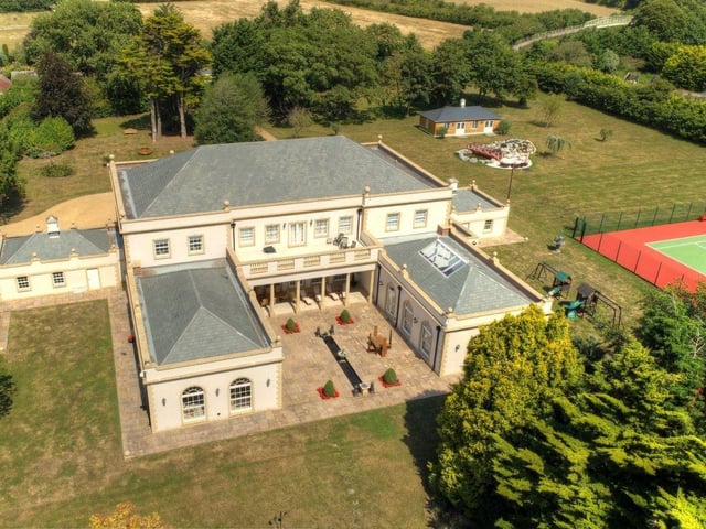 Tall Trees, on the market for £9million, boasts six bedrooms, six reception rooms, a hard tennis court, formal gardens and indoor swimming.