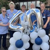 St Catherine's staff celebrating 40 years of care