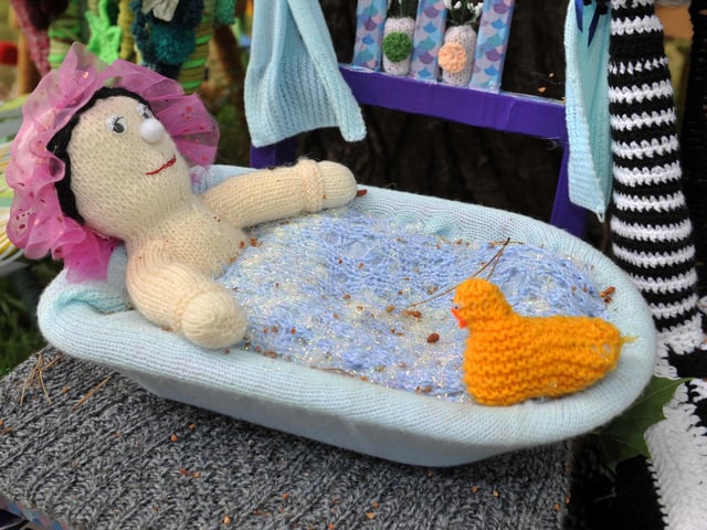 East Preston Yarnbombers have created an enchanting picnic area with chairs that are beautifully-decorated knitted masterpieces