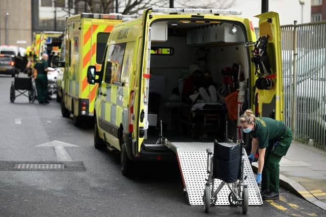 East Sussex Healthcare NHS Trust data revealed: Waiting times for ambulances, A&E and GP referrals (Photo by DANIEL LEAL/AFP via Getty Images)
