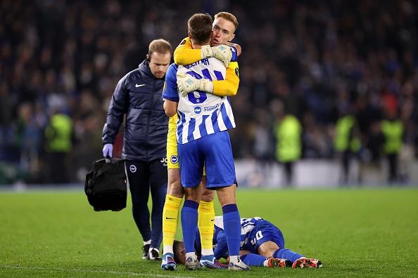 Jason Steele and Joel Veltman of Brighton & Hove Albion celebrate after the team's victory