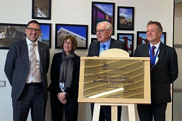 Chief finance officer Justin Holliday, right, with, from left, Colin Casse, Kerry Basnett and Sir Peter Bottomley
