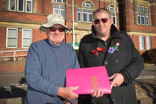 Stephen Pariser (left) and Andrew Crotty outside Bexhill Town Hall just before they handed in a petition against the closure of public toilets in Bexhill. The petition, at the time, had 1805 signatures.