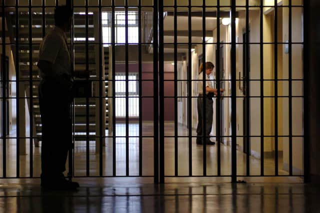 Prison Guards make last minute checks to the Woman's wing.