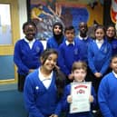 Christian Aid teachers support pupils to achieve awards.