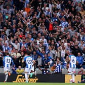Pascal Gross of Brighton & Hove Albion celebrates in front of the fans after scoring the team's third goal during the Premier League match between Brighton & Hove Albion and Southampton FC at American Express Community Stadium on May 21, 2023 in Brighton, England. (Photo by Richard Heathcote/Getty Images)