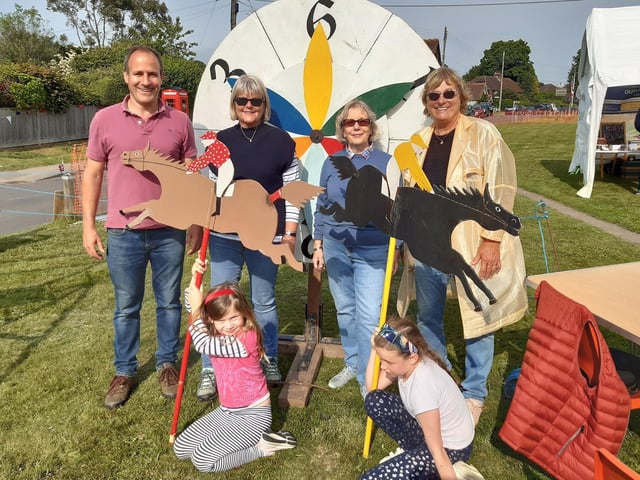 Horsted Keynes villagers had a night out at the races on Saturday, June 4, thanks to the Horsted Cahagnes Society and Horsted Keynes Preschool. Horse Racing on the Green saw people bid for model horses on poles through an auction and then watch to see who won the race.
