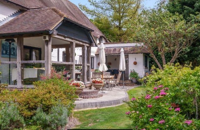 The landscaped garden has plenty of space to relax or enjoy dining al fresco