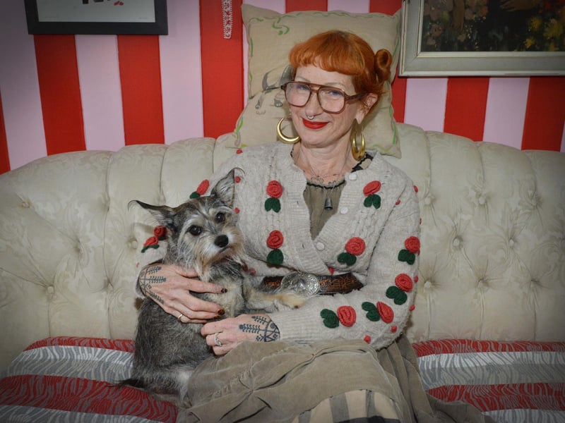 Unzipped Sewing Café at 40a Marina, St Leonards. Owner Vanessa Newman is pictured with her dog, Coco.