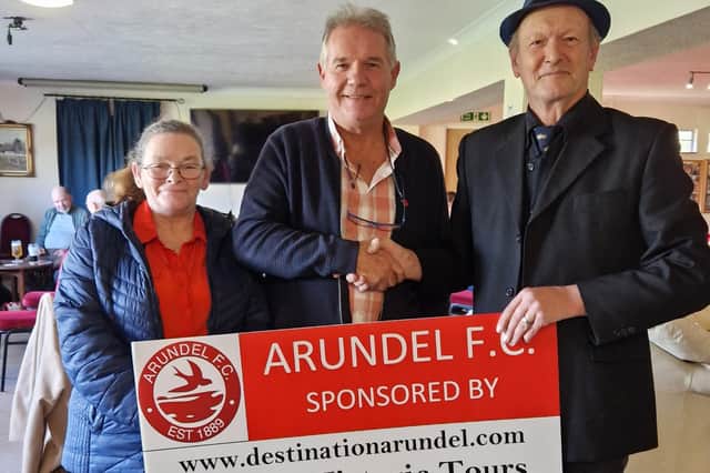 Martin Alderton and his partner Karen Tunnicliffe shake hands with Arundel Football Club chairman Bob Marchant, centre, on a two-year sponsorship deal