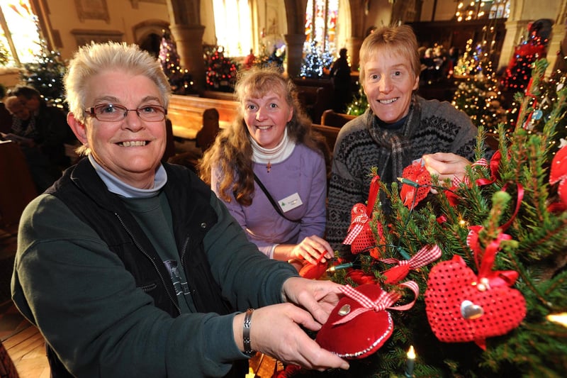 Cuckfield Christmas Tree Festival. From left: Sue Towns, Suzanne Reid and Sarah Godfrey (of the Christmas Tree Festival committee)