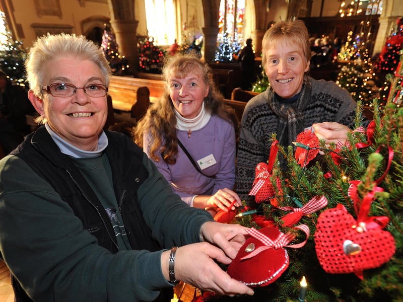 Cuckfield Christmas Tree Festival. From left: Sue Towns, Suzanne Reid and Sarah Godfrey (of the Christmas Tree Festival committee)