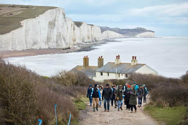 LYT Productions and Lewes District Council organisers recce the Walk the Chalk site at Coastguard Cottages overlooking The Seven Sisters. Photo credit Alex Franklin.