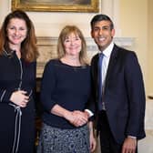 Liz Walke (middle) with Eastbourne MP Caroline Ansell and Prime Minister Rishi Sunak
