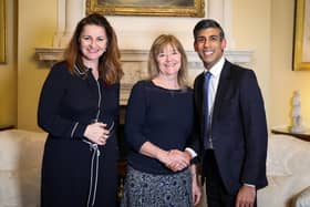 Liz Walke (middle) with Eastbourne MP Caroline Ansell and Prime Minister Rishi Sunak