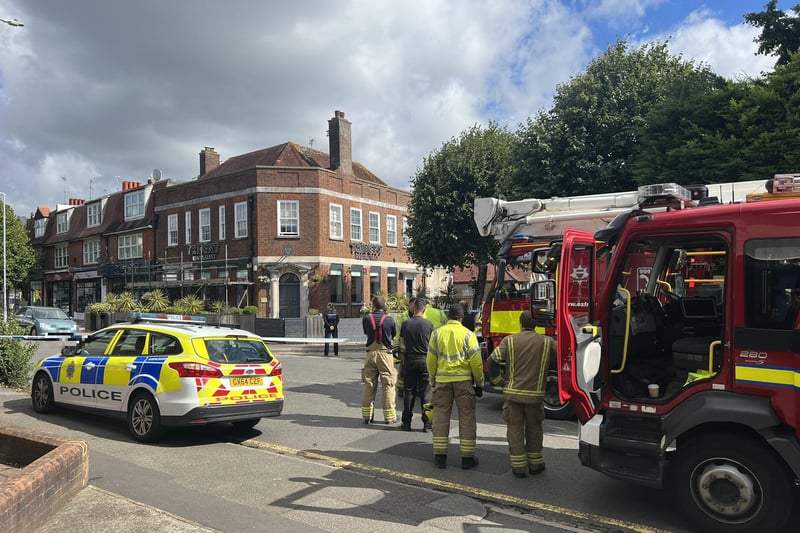 Emergency service crews attending the incident in Green Street, Eastbourne