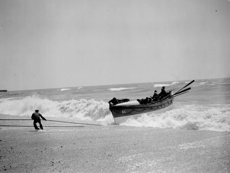 A lifeboat coming in to shore after a practice exercise off Brighton in July 1929: