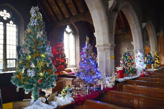 Christmas Tree Festival 2023 at St Michael and All Angels, Glassenbury Drive, Bexhill. This year's theme is Saints.