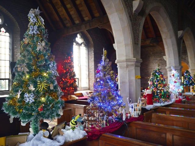 Christmas Tree Festival 2023 at St Michael and All Angels, Glassenbury Drive, Bexhill. This year's theme is Saints.