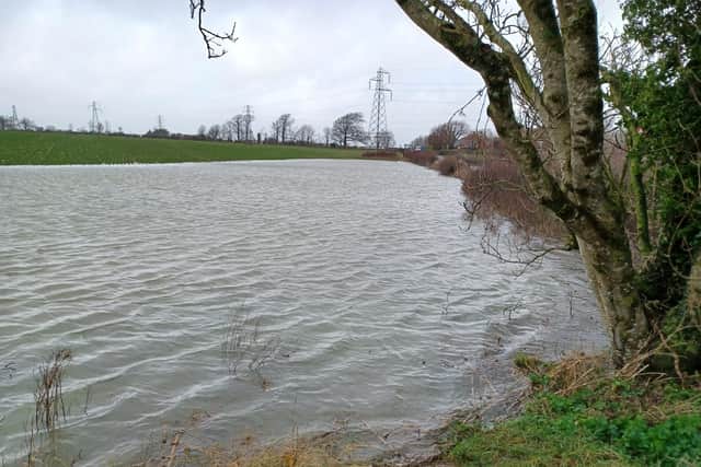The lake has formed on agricultural land to the west of New Road, just south of Lewes Road on the edge of the village.