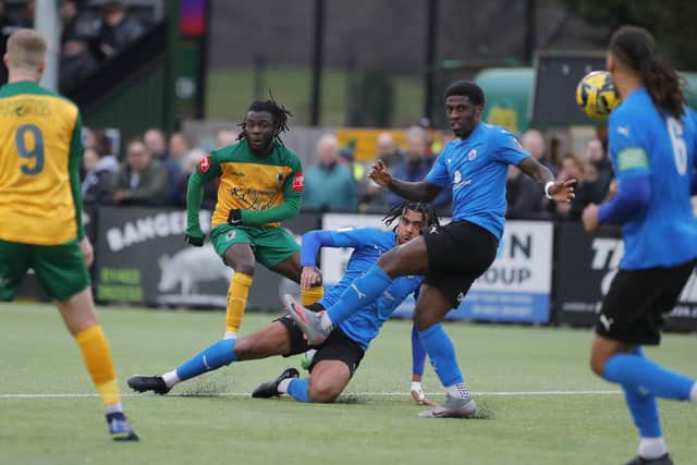 Daniel Ajakaiye fires home Horsham's third against Billericay Town. Pictures by John Lines