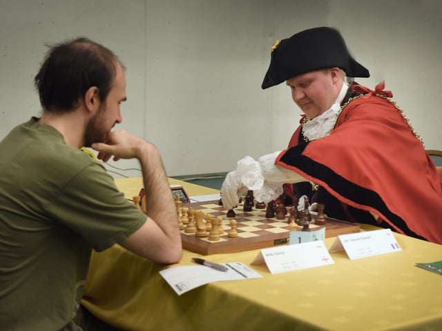 Start of the 96th Caplin Hastings International Chess Congress December 28 2022. Councillor James Bacon, Mayor of Hastings, making the first move.