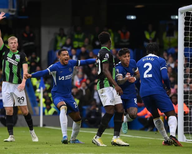 Levi Colwill began to celebrate after scoring for Chelsea against Brighton but paused to show respect to this former colleagues and fans. (Photo by Mike Hewitt/Getty Images)