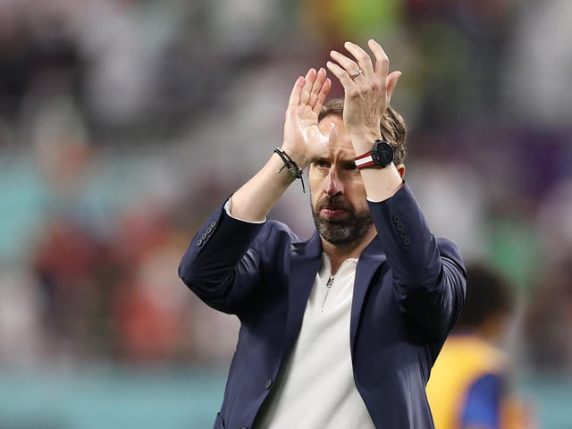DOHA, QATAR - NOVEMBER 21: Gareth Southgate, Head Coach of England, acknowledges the fans after their side's victory the FIFA World Cup Qatar 2022 Group B match between England and IR Iran at Khalifa International Stadium on November 21, 2022 in Doha, Qatar. (Photo by Richard Heathcote/Getty Images)