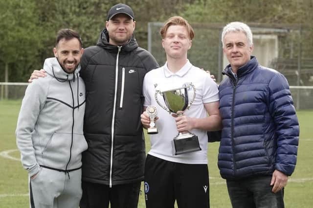 Riley Morgan of the winning U18 team with Roffey 1st team captain Ricardo Fernandes and manager Jack Munday, and Roffey FC chairman Phill Gibbs | Picture supplied