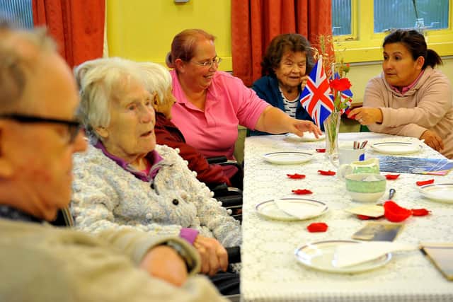 Community cafes help people living with dementia and their carers to socialise