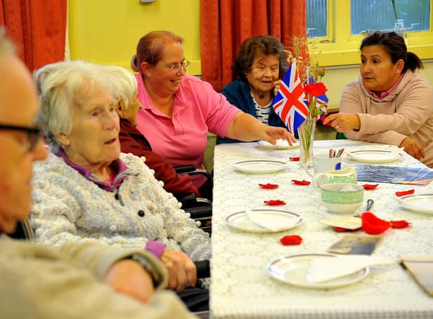 Community cafes help people living with dementia and their carers to socialise
