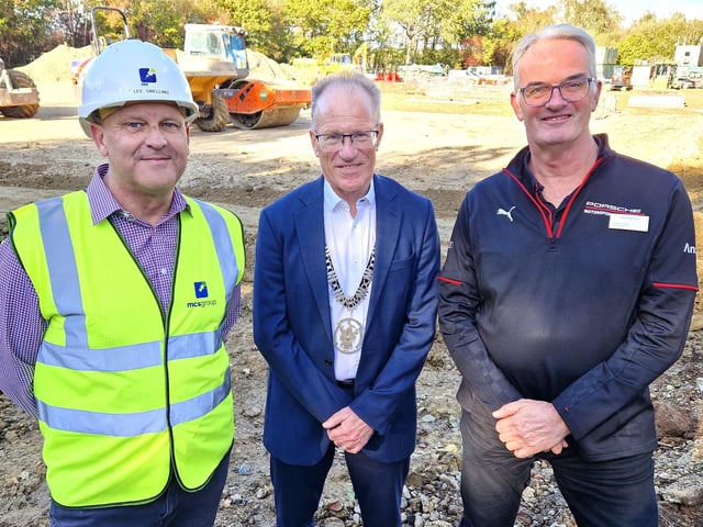 Lee Snelling (Project Manager, MCS group Ltd), Stuart Condie (Burgess Hill Town Mayor), and Andrew Crabb (Head of Business, Porsche Mid Sussex), marking the start of construction work at the new Porsche Centre, Burgess Hill. | Hollie Robards/Iconic Media Group