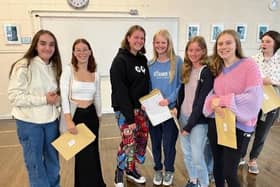 Jubilant students celebrate after receiving their GCSE results today