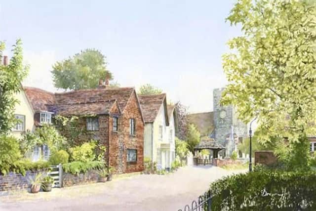 This 17th century cottage (centre of picture) in Woking is for sale at a guide price of £480,000