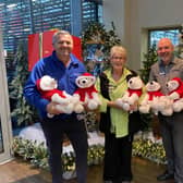 John Price, charity ambassador for My University Hospitals Sussex, left, with Haskins customer services manager Melanie Howick and general manager Nick Joad